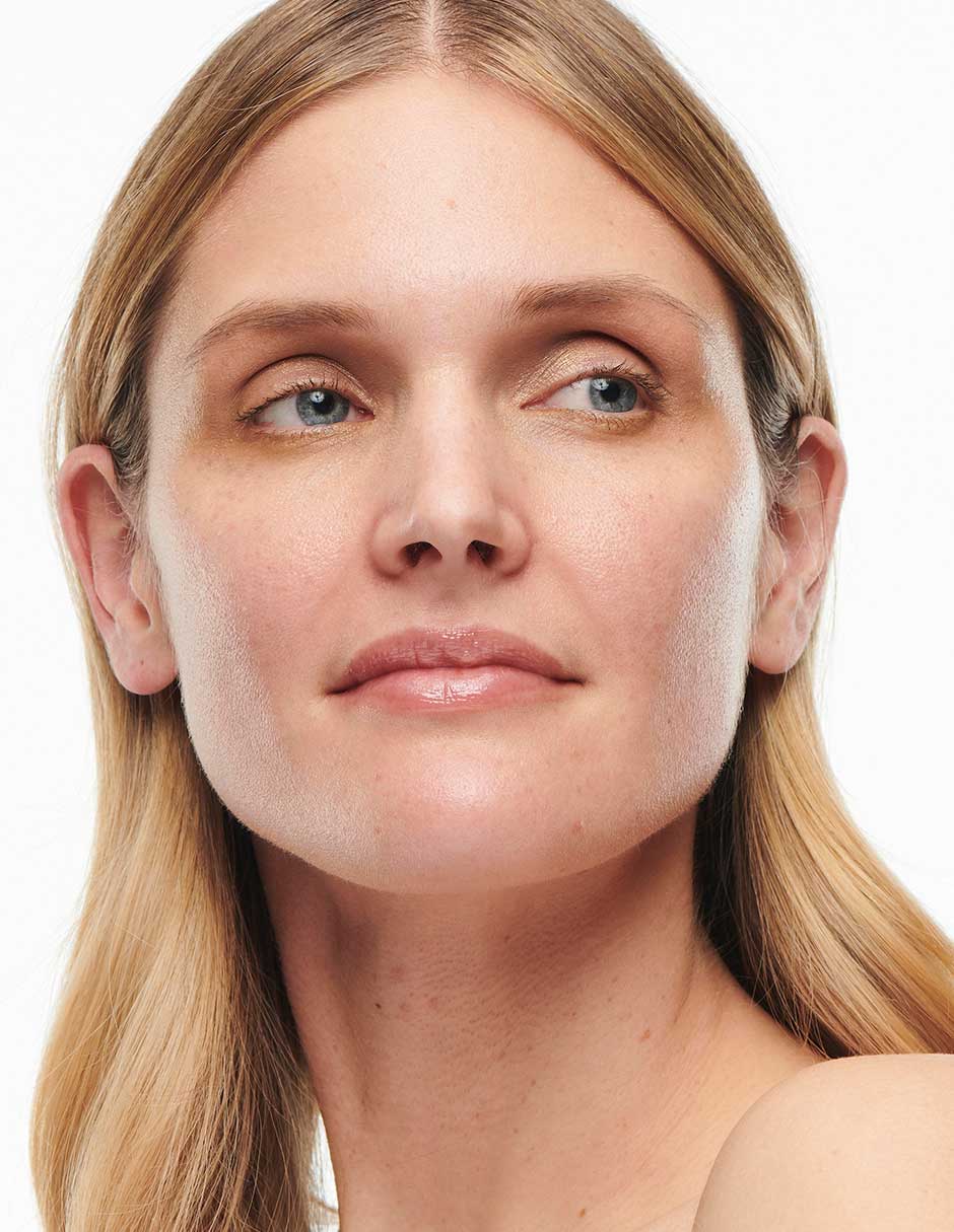 Base de maquillaje líquida Studio Radiance Foundation natural 2