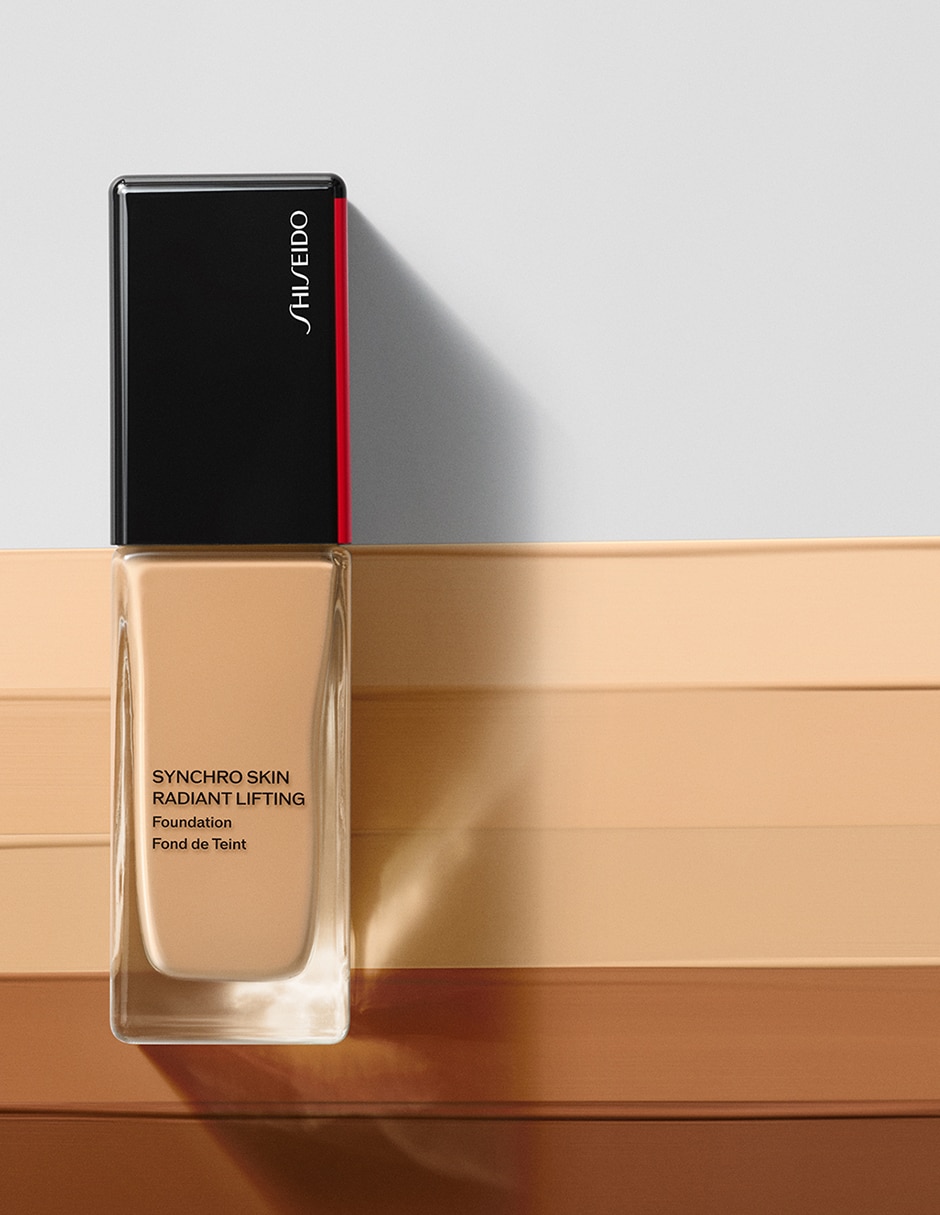 Base de maquillaje líquida Synchro Skin natural 5